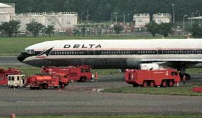 Delta airliner runs aground at Narita airport